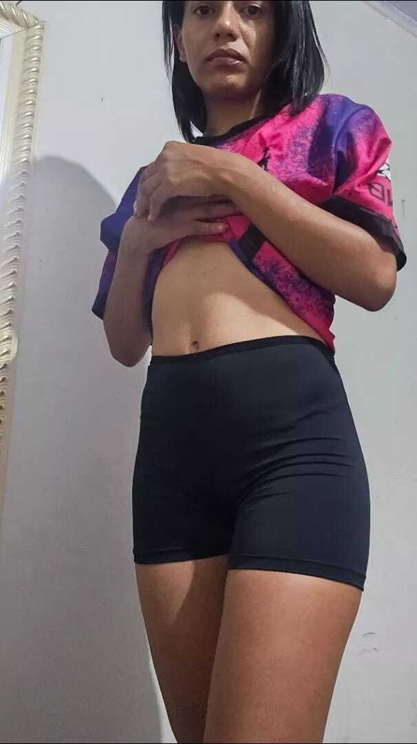 Foto cliente Aline no espelho